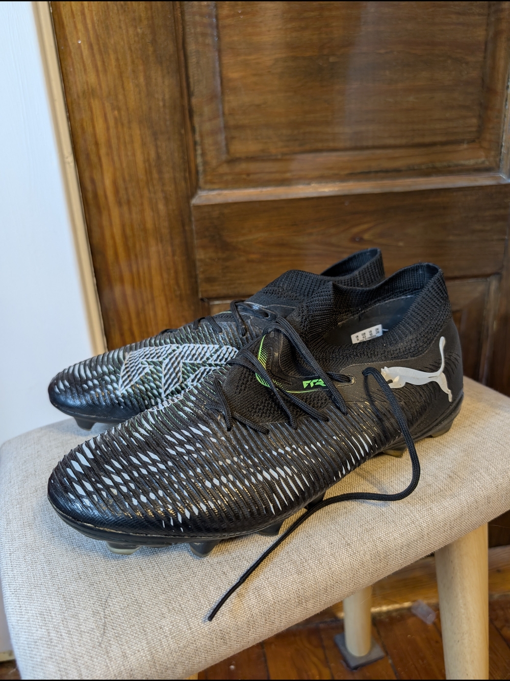Puma Men's Black Soccer Cleats with Silver Logo